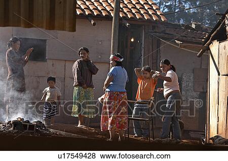 Stock Photo -  fire women brazil aldeia tekoa pyau guarani mbya . Fotosearch