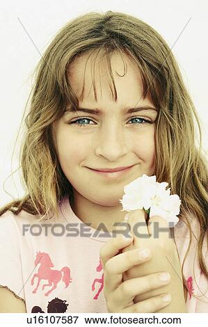 flower girl child portrait holding smiling 6-7 View Large Photo Image Stock Photo - flower girl child portrait holding smiling 6-7. Fotosearch