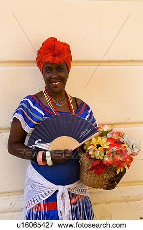 Stock Photo -  flowers old havana habana cuba lady character . Fotosearch