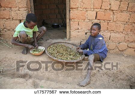 Stock Photo -  food child children burundi didace ndayisaba 13 . Fotosearch