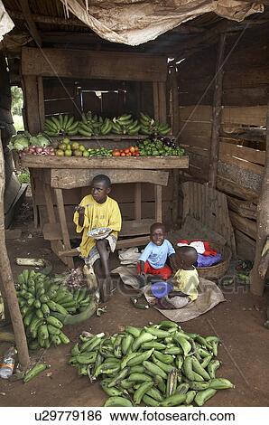 Stock Photograph -  food child children uganda vegetable stall food . Fotosearch