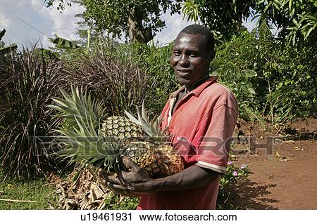 food face uganda batambuze michael holding View Large Photo Image Stock Image - food face uganda batambuze michael holding . Fotosearch