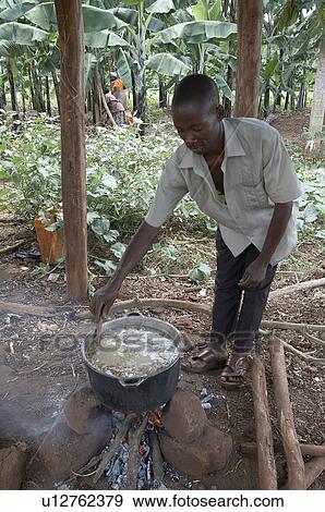 food fire uganda cooking open kayunga district View Large Photo Image Stock Photo - food fire uganda cooking open kayunga district . Fotosearch