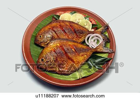 Stock Photo -  food fish karimeen fry kerala style tabletop top. Fotosearch