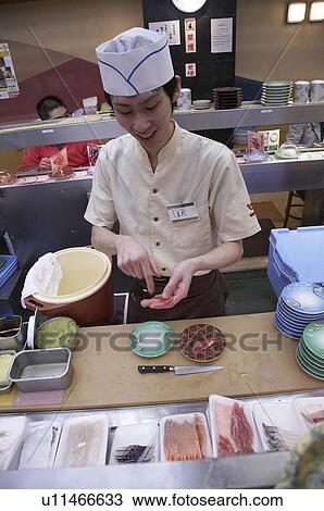 Stock Image -  food japan belt sushi bar sapporo hokkaido asia . Fotosearch