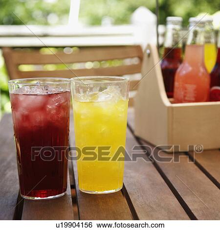 Stock Photograph -  food people closeup two glasses juice . Fotosearch