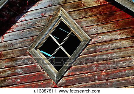 Stock Image -  frame vintage wooden window in old abandoned red. Fotosearch