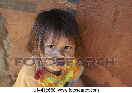 Stock Photo -  girl child children brazil aldeia tekoa pyau girl . Fotosearch