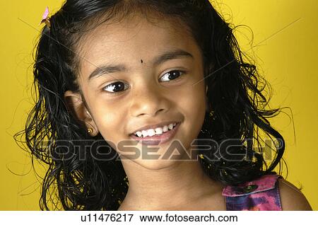 Stock Photo -  girl child children malayalee kids girls smiles. Fotosearch