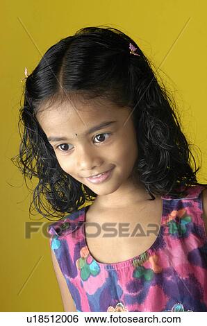 Stock Photograph -  girl child children malayalee kids girls faces. Fotosearch