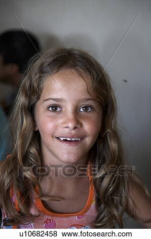 Stock Photo -  girl child face children brazil socorro latiin . Fotosearch
