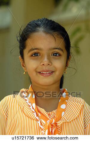 Stock Photograph -  girl child face children cute little faces model. Fotosearch