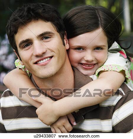 girl child man portrait hugging young View Large Photo Image Stock Photo - girl child man portrait hugging young . Fotosearch