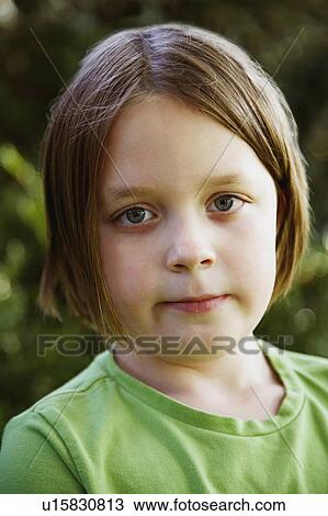 Stock Image -  girl child portrait 8-9 years brown hair casual. Fotosearch