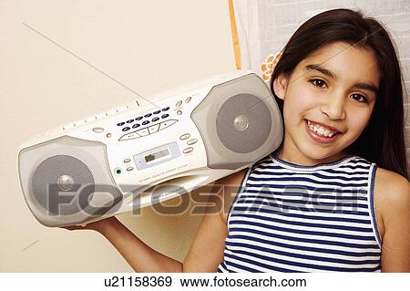 girl child portrait holding tape recorder 10-11 View Large Photo Image Stock Photo - girl child portrait holding tape recorder 10-11. Fotosearch