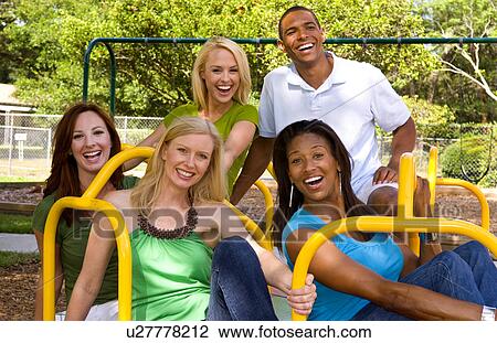 Stock Image -  great group mixed ethnic friends having fun . Fotosearch