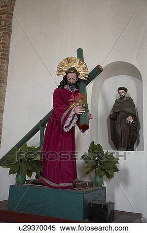 Stock Photography -  guatemala church interior jesus carrying cross. Fotosearch