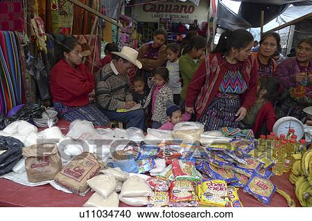 Stock Image -  guatemala group crowded round market stall latin. Fotosearch