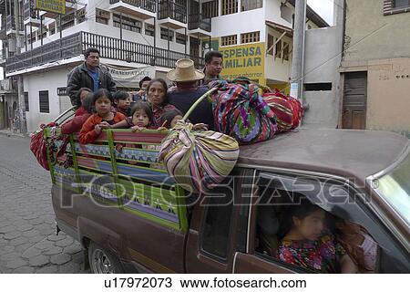 Stock Image -  guatemala passengers travelling pickup truck . Fotosearch