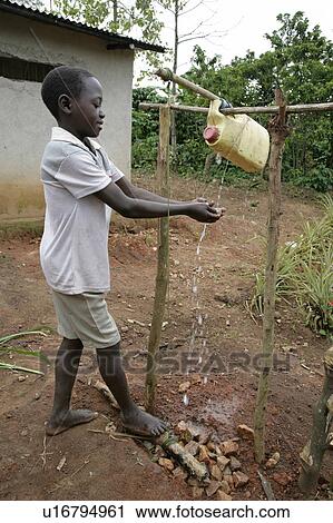 hand child children uganda boy tiptap simple use View Large Photo Image Stock Image - hand child children uganda boy tiptap simple use . Fotosearch