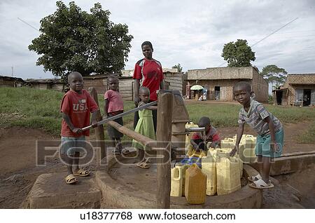 hand child children uganda pumped bore hole View Large Photo Image Stock Photo - hand child children uganda pumped bore hole . Fotosearch