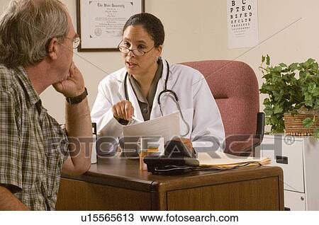 hand doctor female african american male View Large Photo Image Stock Image - hand doctor female african american male . Fotosearch