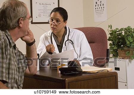 Stock Photo -  hand doctor female african american male . Fotosearch