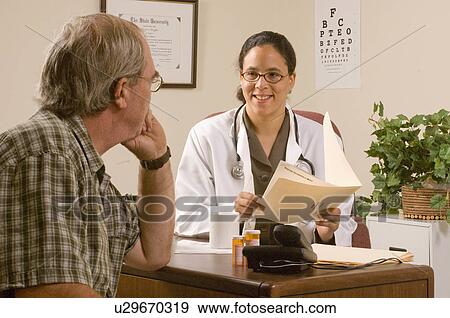 hand doctor female african american male View Large Photo Image Stock Photo - hand doctor female african american male . Fotosearch