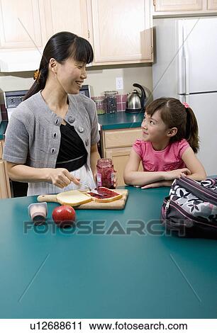 hand school first day ready for asian mother aid View Large Photo Image Stock Image - hand school first day ready for asian mother aid. Fotosearch