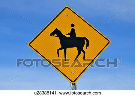 horse yellow highway sign warning riders road View Large Photo Image Stock Image - horse yellow highway sign warning riders road. Fotosearch