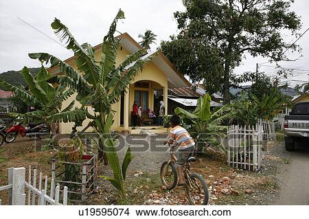 Picture -  house child children indonesia fitriah in rima . Fotosearch