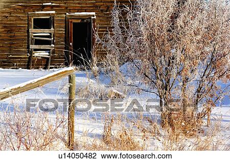 Stock Image -  house winter front door window section pioneer. Fotosearch