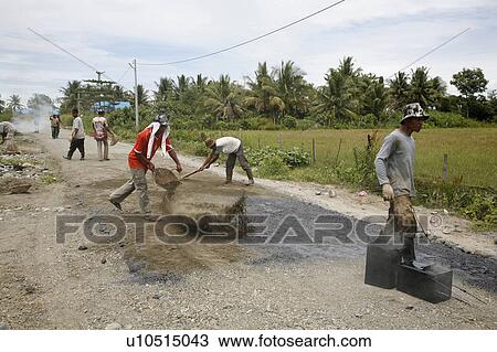 indonesia workers asphalting road View Large Photo Image Stock Image - indonesia workers asphalting road . Fotosearch