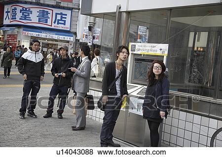 Stock Photo -  japan shibuya tokyo public smoking area in asia. Fotosearch