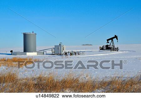 landscape image oil pump storage tank well site View Large Photo Image Stock Image - landscape image oil pump storage tank well site. Fotosearch