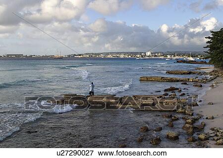 Stock Photo -  man barbados bwi code island tourist travel town. Fotosearch