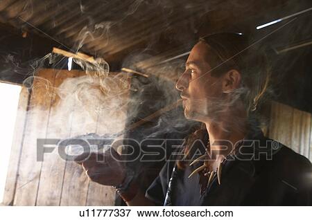 Stock Photo -  man brazil aldeia tekoa pyau guarani mbya slum . Fotosearch