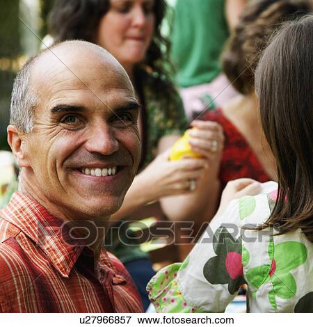 Stock Photo - man closeup mature smiling 50-54 years brown. Fotosearch