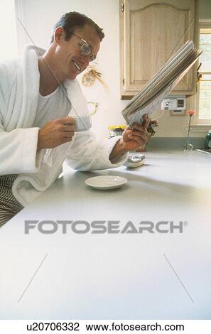 man coffee person home reading morning newspaper View Large Photo Image Stock Image - man coffee person home reading morning newspaper. Fotosearch