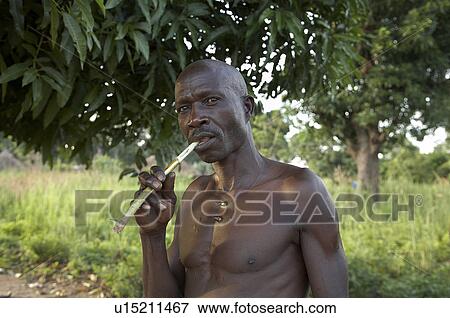 man face south sudan early morning scene farm man View Large Photo Image Stock Photo - man face south sudan early morning scene farm man . Fotosearch