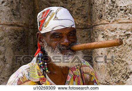 man havana capitol city cuba closeup older long cigar View Large Photo Image Stock Photo - man havana capitol city cuba closeup older long cigar. Fotosearch