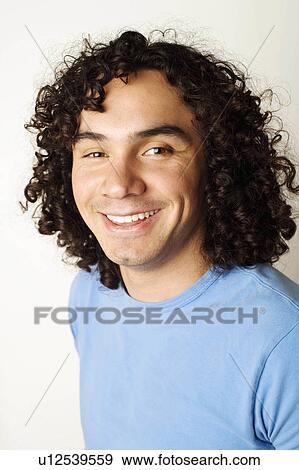 Stock Photo -  man person portrait young smiling 20-24 years. Fotosearch