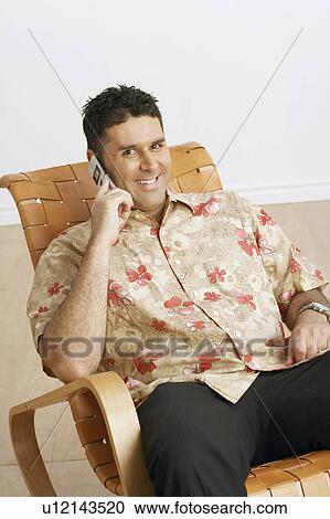 man portrait mid adult sitting chair talking View Large Photo Image Stock Image - man portrait mid adult sitting chair talking. Fotosearch