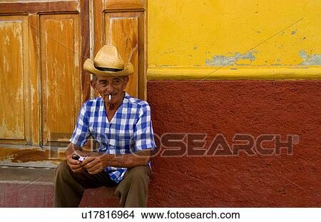 man portrait old cowboy hat in front yellow wall View Large Photo Image Picture - man portrait old cowboy hat in front yellow wall. Fotosearch