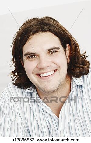 Stock Image -  man portrait young smiling 25-29 years brown hair. Fotosearch