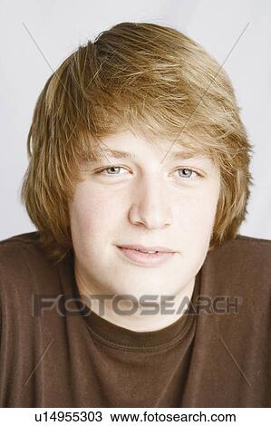 man portrait young smirking 18-19 years brown View Large Photo Image Stock Image - man portrait young smirking 18-19 years brown. Fotosearch