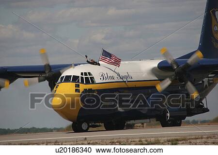 Stock Image -  marines c130j30 american flag airshow military. Fotosearch