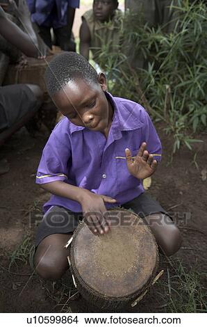 Picture -  music child school children uganda kyayaaye in uganda. Fotosearch