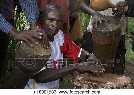 Stock Image -  music dance face uganda drummers event . Fotosearch