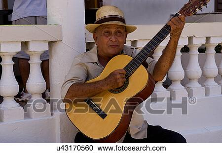 Stock Image -  music man havana cuba habana playing guitar . Fotosearch